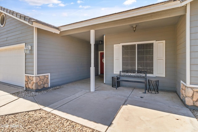 20464 E Bronco Dr, Queen Creek, AZ 85142 - view of exterior entry with stone siding and an attached garage