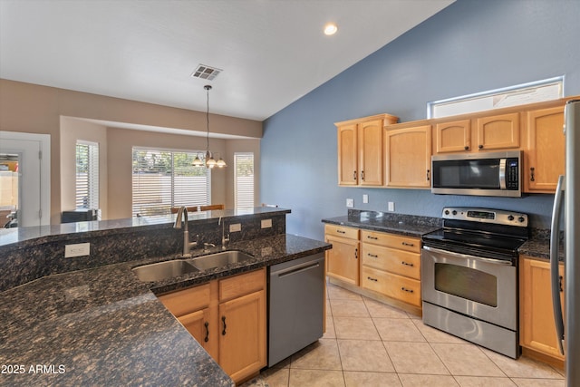 20464 E Bronco Dr, Queen Creek, AZ 85142 - kitchen featuring stainless steel appliances, light brown cabinets, a chandelier, light tile patterned floors, and high vaulted ceiling