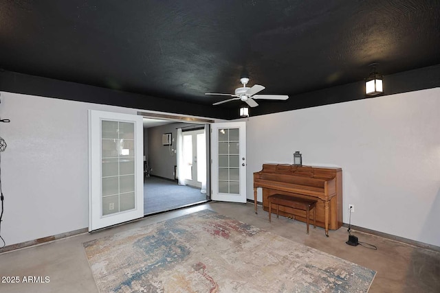5634 N 39th Ave, Phoenix, AZ 85019 - interior space featuring baseboards, finished concrete flooring, and ceiling fan