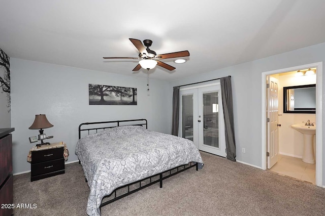 5634 N 39th Ave, Phoenix, AZ 85019 - carpeted bedroom with connected bathroom, access to outside, baseboards, and a ceiling fan