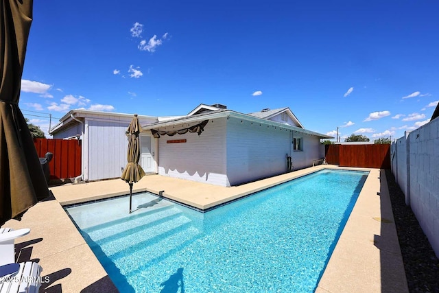 5634 N 39th Ave, Phoenix, AZ 85019 - view of pool featuring a patio, a fenced in pool, and a fenced backyard