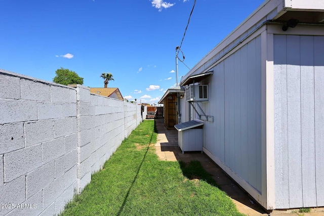 5634 N 39th Ave, Phoenix, AZ 85019 - view of side of property featuring a lawn and fence