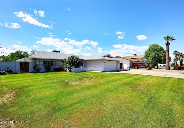 5634 N 39th Ave, Phoenix, AZ 85019 - ranch-style home with concrete driveway, an attached garage, fence, and a front yard