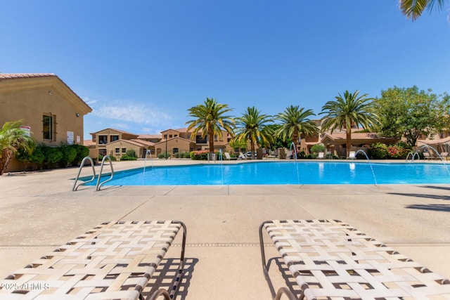 pool with a patio