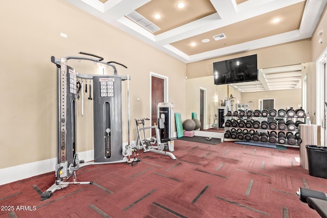 gym with recessed lighting, visible vents, and coffered ceiling