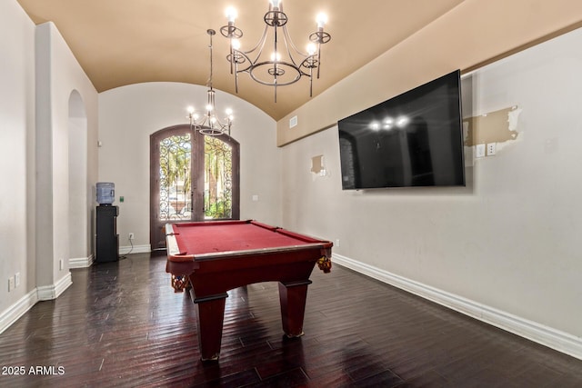 playroom featuring baseboards, lofted ceiling, wood-type flooring, and a notable chandelier