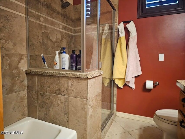 bathroom featuring tile patterned flooring and toilet