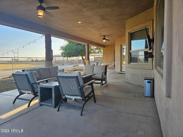 view of patio / terrace featuring ceiling fan and an outdoor hangout area