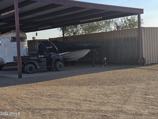 view of parking with a carport