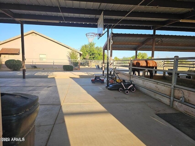 view of patio / terrace with an outbuilding