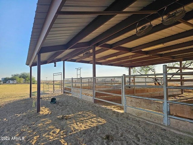 view of yard featuring an outbuilding and a rural view