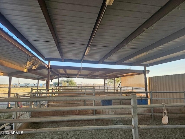 view of stable featuring a rural view