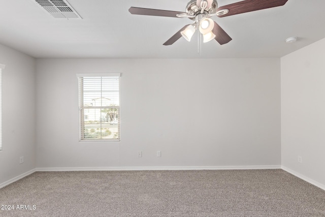 carpeted empty room with ceiling fan