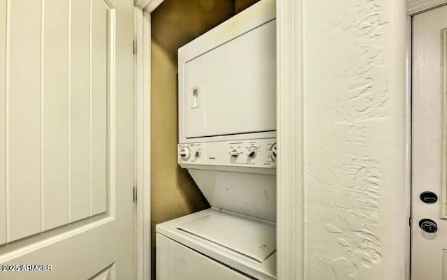 2600 W Old Linden Rd, Show Low, AZ 85901 - clothes washing area featuring stacked washing machine and dryer