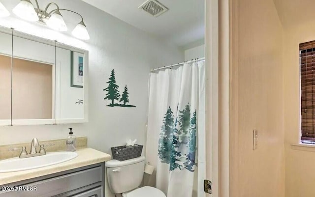 2600 W Old Linden Rd, Show Low, AZ 85901 - bathroom featuring toilet, vanity, and a shower with shower curtain