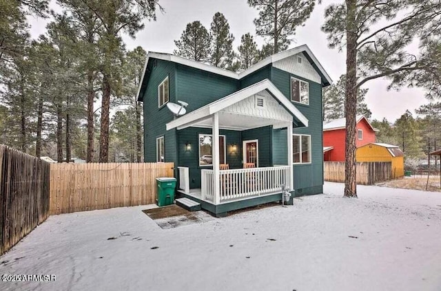 2600 W Old Linden Rd, Show Low, AZ 85901 - view of front of property featuring covered porch and fence