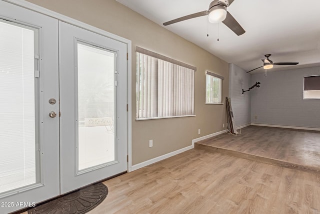 10001 W Caron Dr, Sun City, AZ 85351 - entryway with a ceiling fan, light wood finished floors, and baseboards