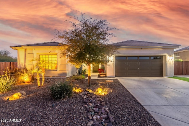 view of front of property featuring a garage