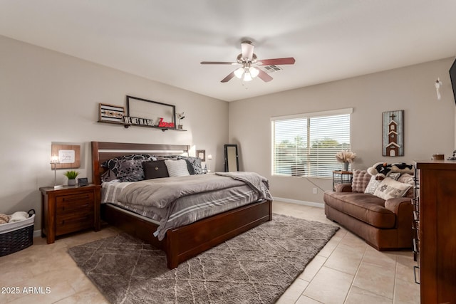 tiled bedroom with ceiling fan