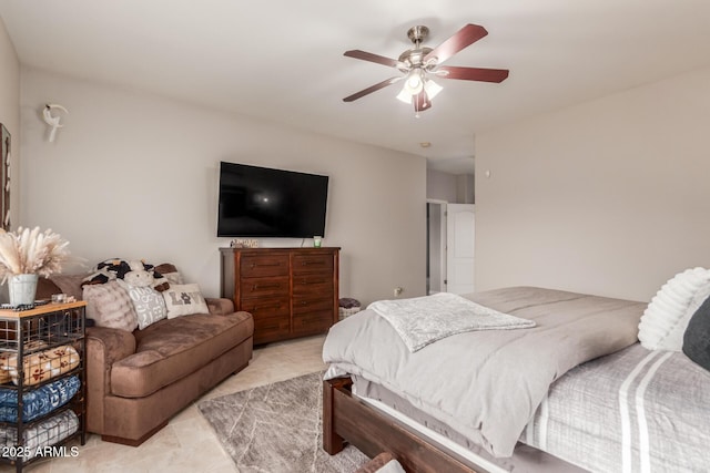 bedroom featuring ceiling fan and light tile patterned floors