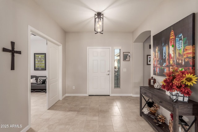 entrance foyer featuring light tile patterned floors