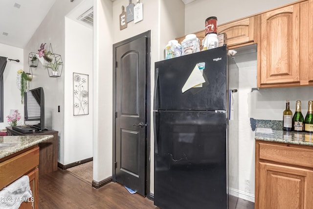 4243 E Jasper Dr, Gilbert, AZ 85296 - kitchen featuring freestanding refrigerator, dark wood-type flooring, light stone countertops, and baseboards