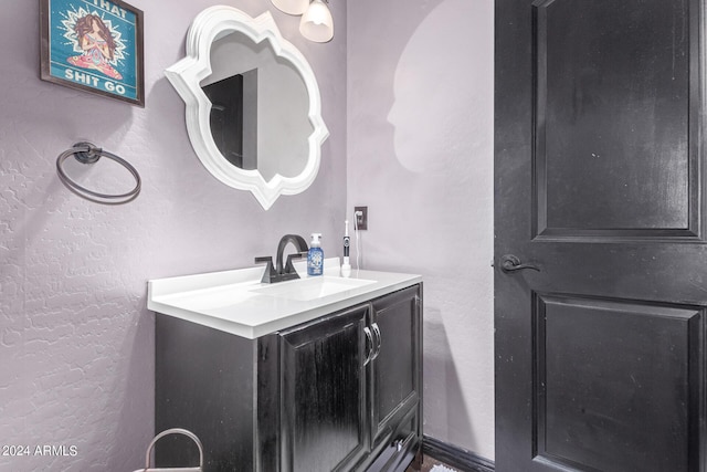 4243 E Jasper Dr, Gilbert, AZ 85296 - bathroom featuring a textured wall and vanity