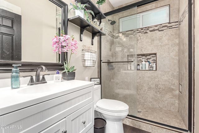 4243 E Jasper Dr, Gilbert, AZ 85296 - bathroom featuring toilet, a stall shower, vanity, and wood finished floors
