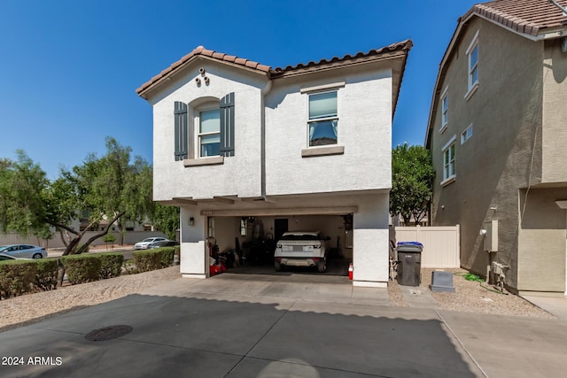 4243 E Jasper Dr, Gilbert, AZ 85296 - mediterranean / spanish-style house with a tiled roof, stucco siding, a garage, and concrete driveway