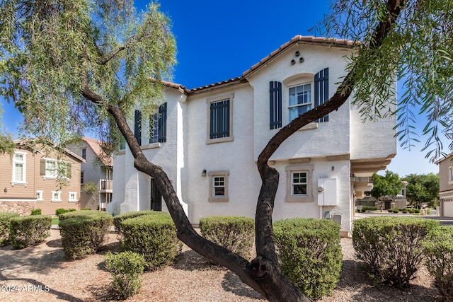 4243 E Jasper Dr, Gilbert, AZ 85296 - rear view of house featuring a tiled roof and stucco siding