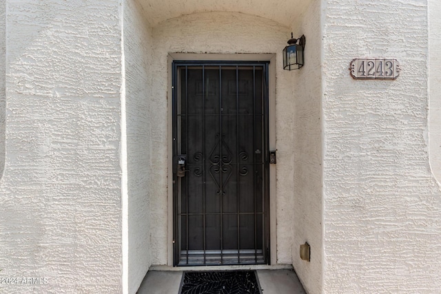 4243 E Jasper Dr, Gilbert, AZ 85296 - doorway to property featuring stucco siding