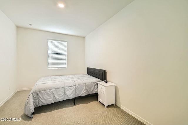 bedroom with light carpet