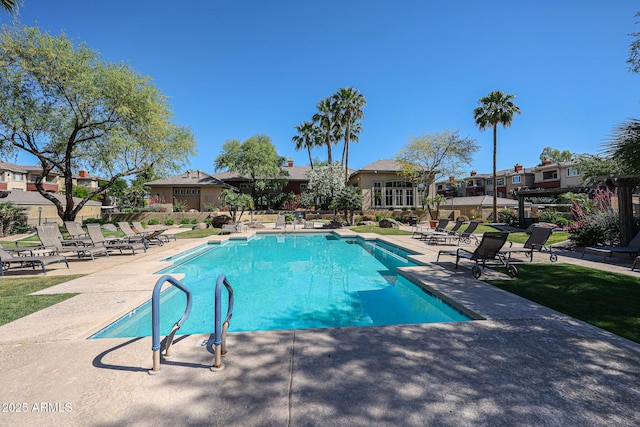 view of swimming pool featuring a patio