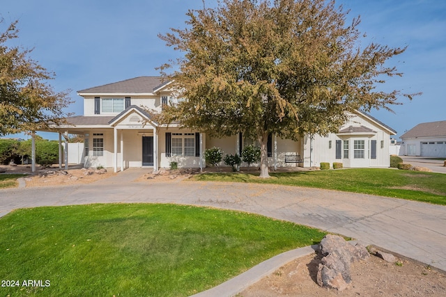 view of front of property with a front lawn and a porch