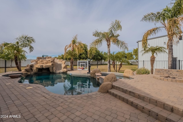 view of pool featuring a patio area