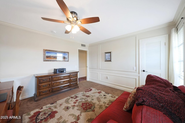 bedroom with carpet floors, a ceiling fan, crown molding, and visible vents