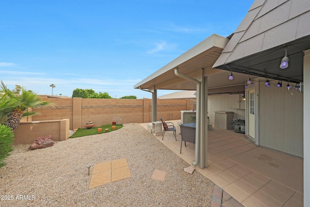 view of patio with fence