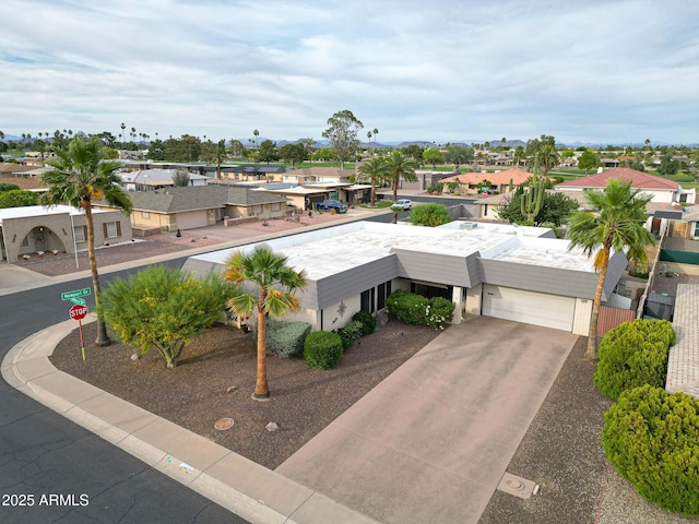 birds eye view of property with a residential view