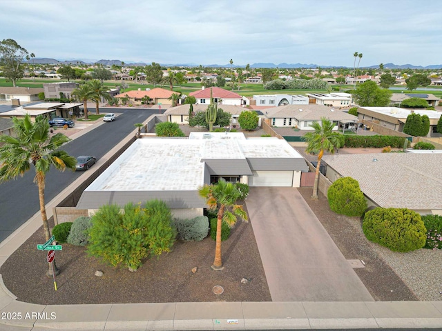aerial view featuring a residential view and a mountain view