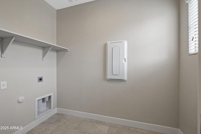 clothes washing area with light tile patterned floors, hookup for a gas dryer, and hookup for an electric dryer