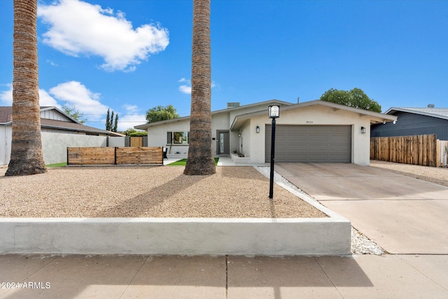 single story home with a garage