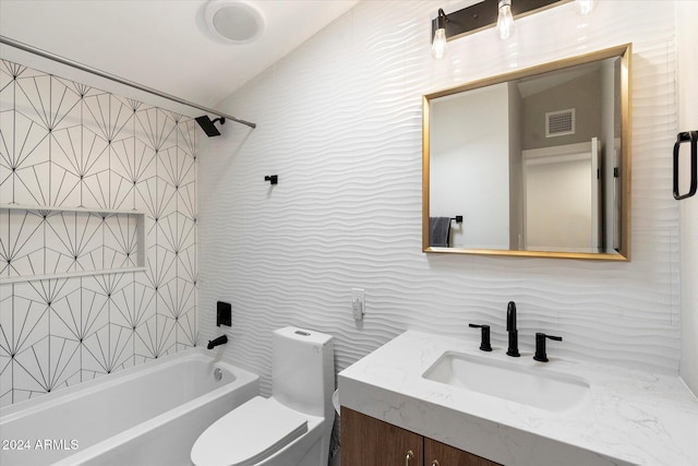 full bathroom featuring toilet, tile walls, vanity, tiled shower / bath combo, and decorative backsplash