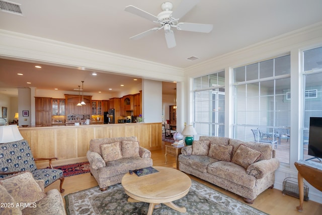 19125 N Lower Territory Rd, Prescott, AZ 86305 - living room with crown molding, ceiling fan, light wood-style flooring, and recessed lighting