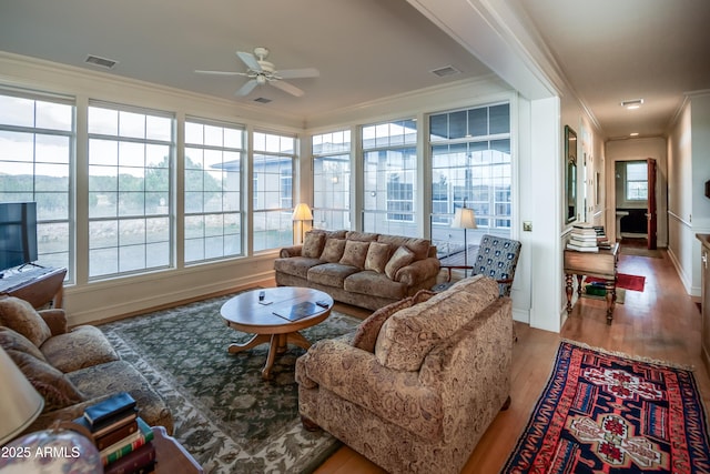 19125 N Lower Territory Rd, Prescott, AZ 86305 - living area with ornamental molding, ceiling fan, and light wood-type flooring
