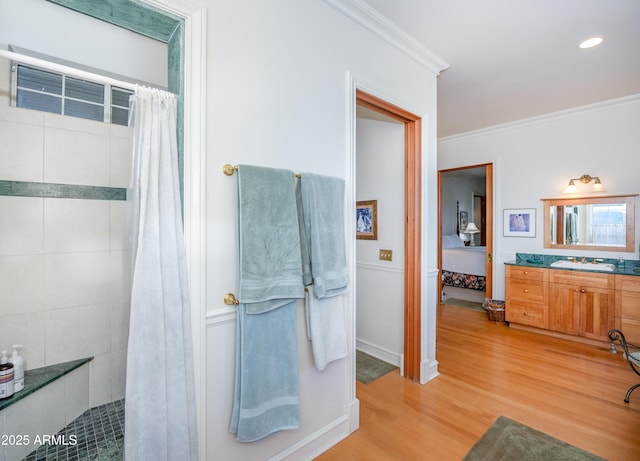 19125 N Lower Territory Rd, Prescott, AZ 86305 - full bath with tiled shower, wood finished floors, crown molding, vanity, and connected bathroom