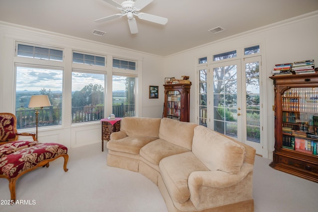 19125 N Lower Territory Rd, Prescott, AZ 86305 - living room featuring carpet, crown molding, and a ceiling fan