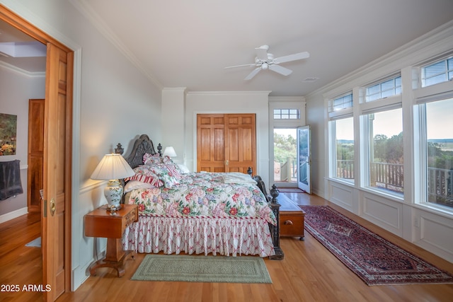 19125 N Lower Territory Rd, Prescott, AZ 86305 - bedroom with crown molding, wood finished floors, multiple windows, and a closet