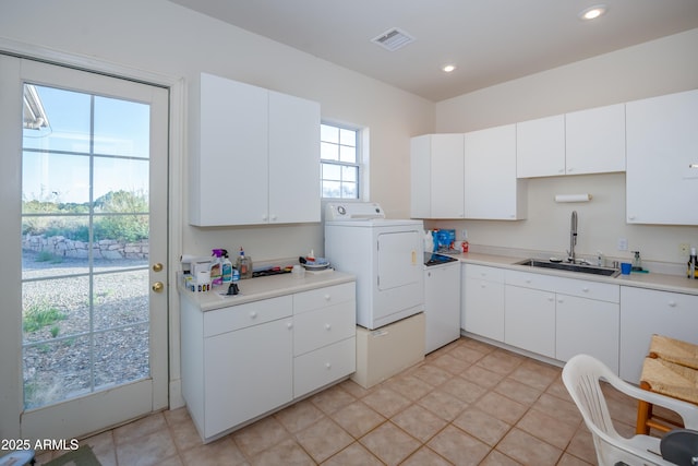 19125 N Lower Territory Rd, Prescott, AZ 86305 - kitchen featuring washer / dryer, light countertops, white cabinets, and recessed lighting