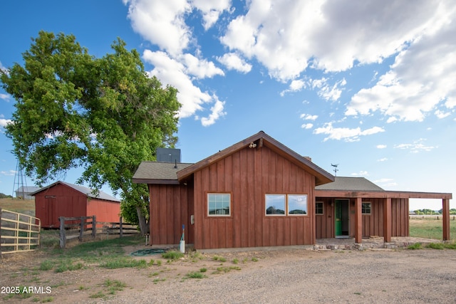 19125 N Lower Territory Rd, Prescott, AZ 86305 - view of front of house with board and batten siding and an outdoor structure