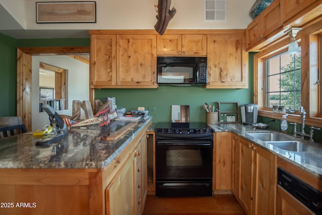 19125 N Lower Territory Rd, Prescott, AZ 86305 - kitchen featuring black appliances, wood finished floors, and dark stone countertops